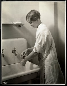 A Nurse Washing Her Hands